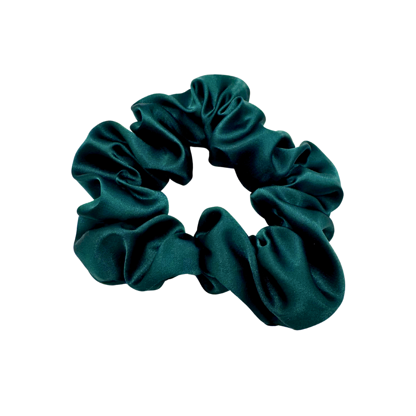 Emerald green satin scrunchie with a soft, luminous sheen and gently gathered folds. Handmade in Canada for elegant, damage-free styling and a secure, gentle hold.