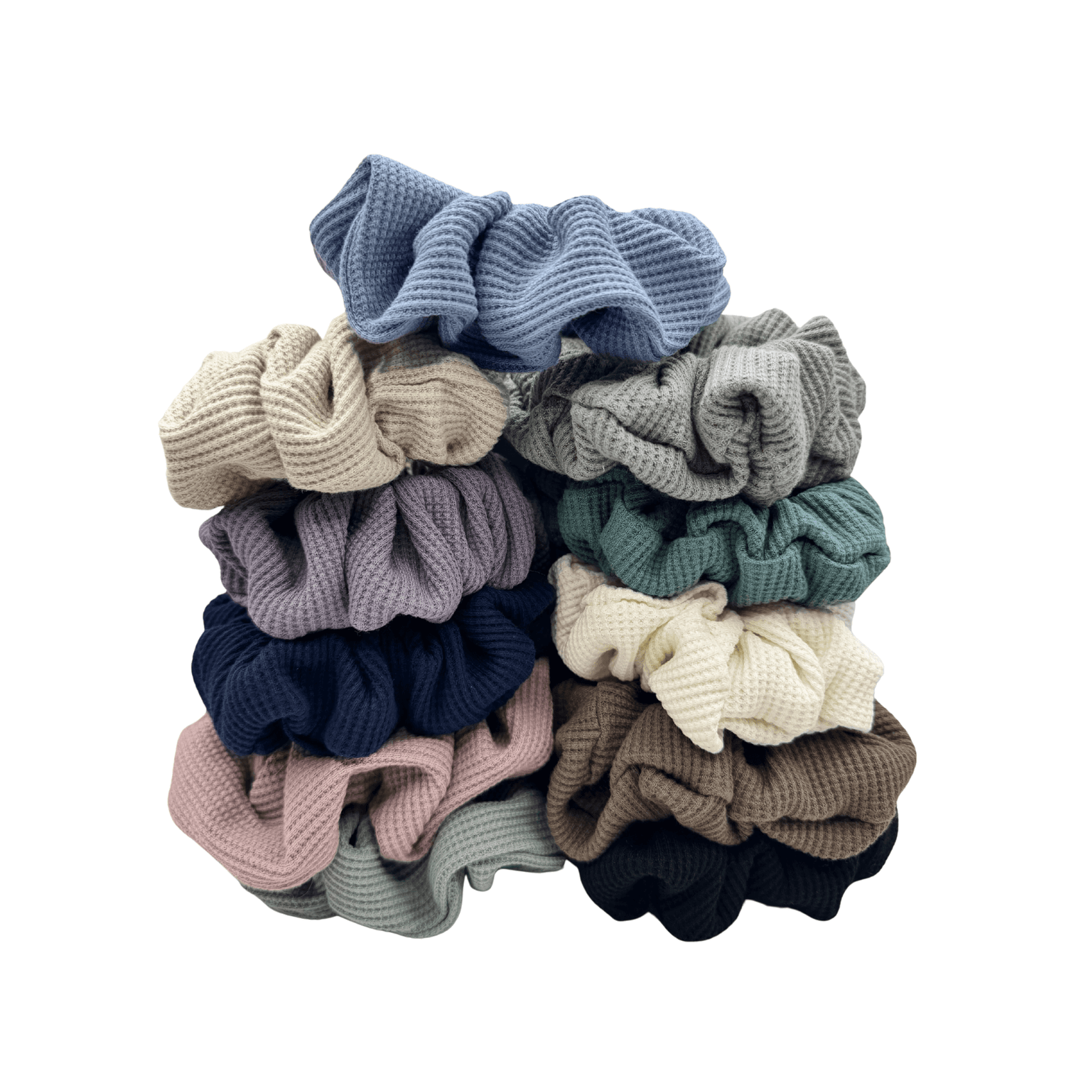 Set of twelve waffle-knit fabric scrunchies in a variety of colors including blue, beige, purple, green, brown, black, and cream. Arranged in two neat vertical stacks
