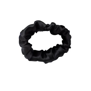 Black satin scrunchie with a smooth, glossy finish, gathered into soft ruffled folds. Handmade hair accessory designed for a gentle, secure hold and a sleek, timeless look.