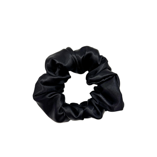 Black satin scrunchie with a smooth, glossy finish, gathered into soft ruffled folds. Handmade hair accessory designed for a gentle, secure hold and a sleek, timeless look.