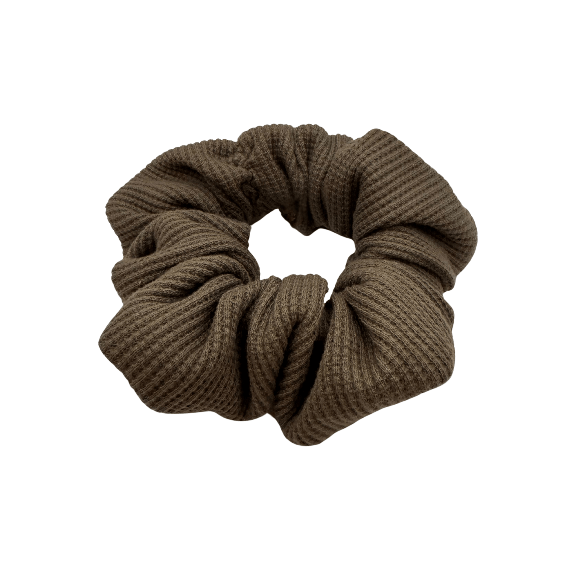 One XL brown waffle-knit cotton scrunchie. The textured fabric features a soft, ribbed pattern, offering a cozy and voluminous look. Ideal for gentle hair styling across different hair types and preferences