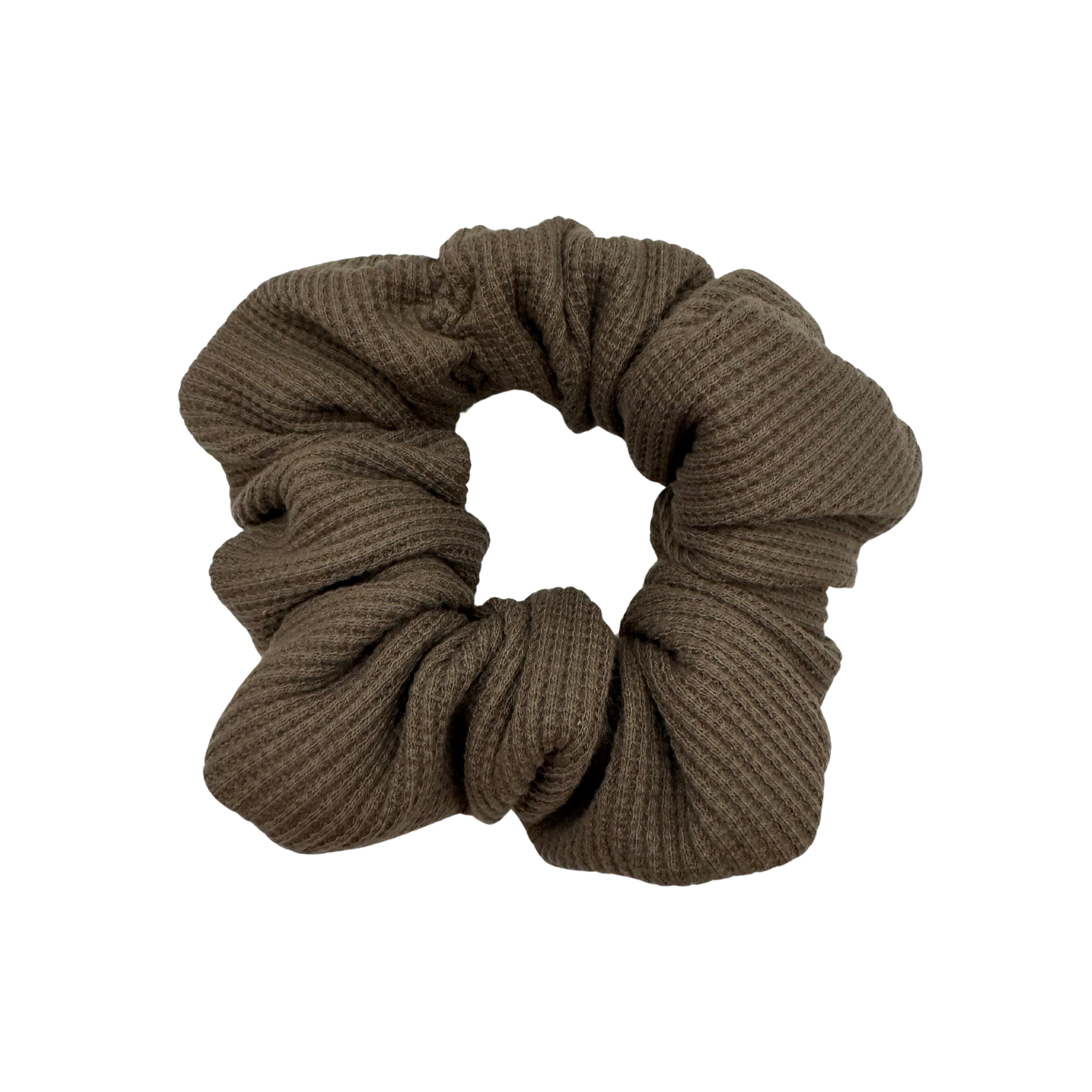 One XL brown waffle-knit cotton scrunchies.  The textured fabric features a soft, ribbed pattern, offering a cozy and voluminous look. Ideal for gentle hair styling across different hair types and preferences
