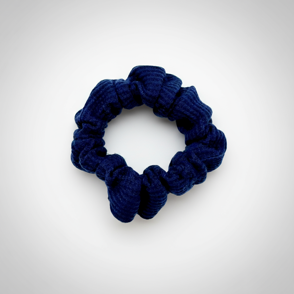 Deep navy Waffle Knit Cotton scrunchie with soft, gathered folds. Handmade for a gentle, secure hold and effortlessly graceful everyday styling—ideal for thick or curly hair.
