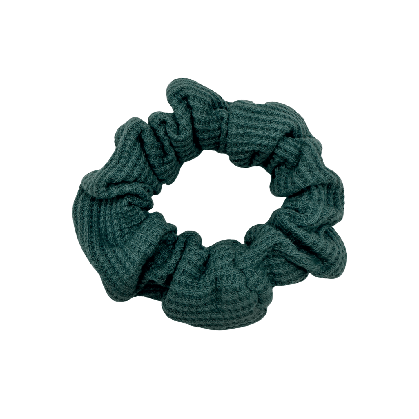 Teal textured scrunchie on a white background
