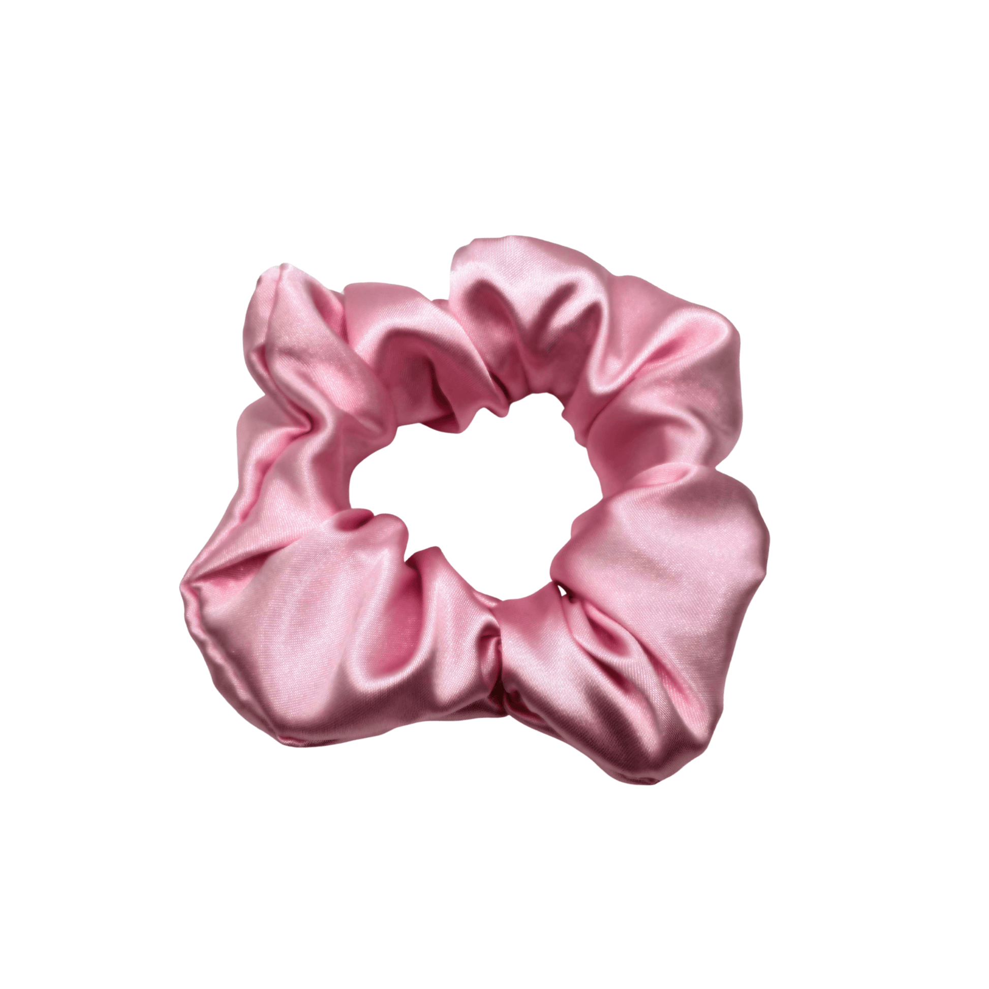 Baby pink satin scrunchie with a smooth, lustrous finish, arranged in soft ruffled folds. Handmade accessory designed for a gentle, secure hold and a timeless, elegant look.