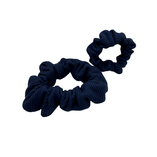 Deep navy Waffle Knit Cotton scrunchie with soft, gathered folds. Handmade for a gentle, secure hold and effortlessly graceful everyday styling—ideal for thick or curly hair.