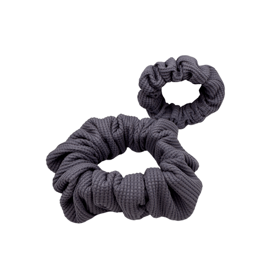 Two Waffle Knit Cotton scrunchie in a rich purple hue, gathered into soft folds for visual charm and gentle volume. Handmade for a secure, damage-free hold and effortlessly graceful everyday styling.