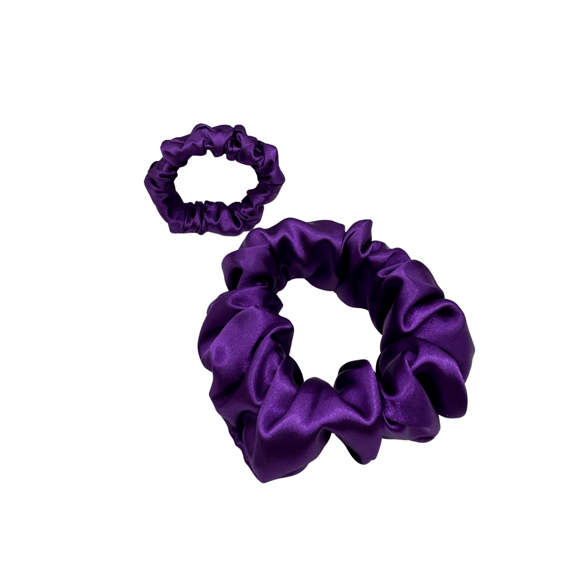 Two Medium-purple satin scrunchie with a soft, glossy finish and gently gathered ruffles. Handmade hair accessory designed for a secure, gentle hold and a romantic, celestial-inspired look.