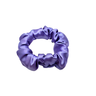 Purple satin scrunchie with a smooth, glossy finish and softly gathered folds. Handmade hair accessory designed for a gentle, secure hold and a romantic, celestial-inspired look.