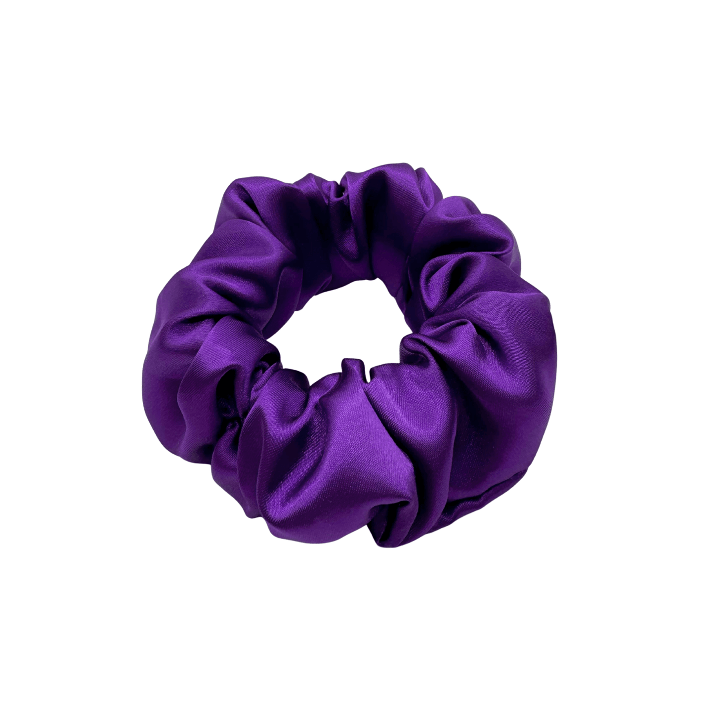 Medium-purple satin scrunchie with a soft, glossy finish and gently gathered ruffles. Handmade hair accessory designed for a secure, gentle hold and a romantic, celestial-inspired look.