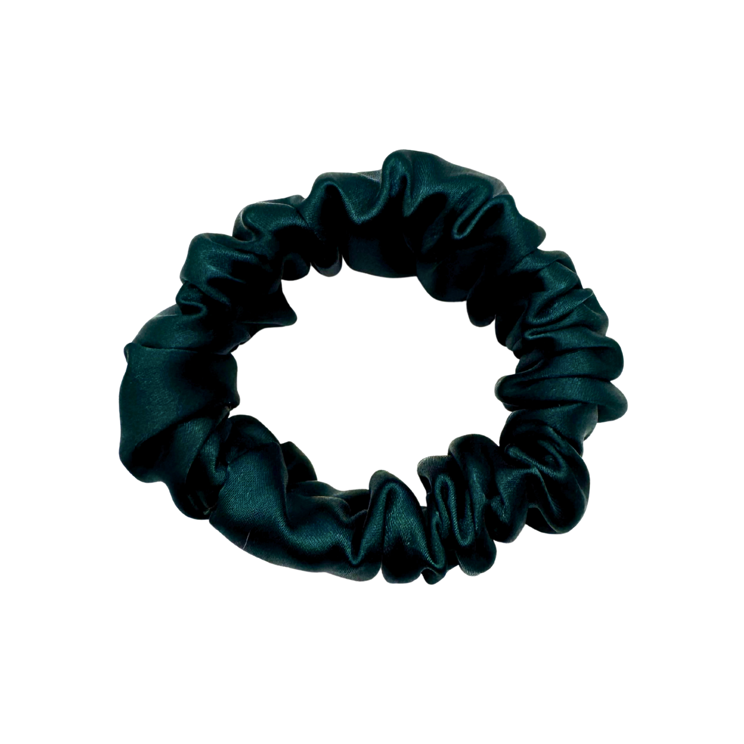 Emerald green satin scrunchie with a soft, luminous sheen and gently gathered folds. Handmade in Canada for elegant, damage-free styling and a secure, gentle hold.
