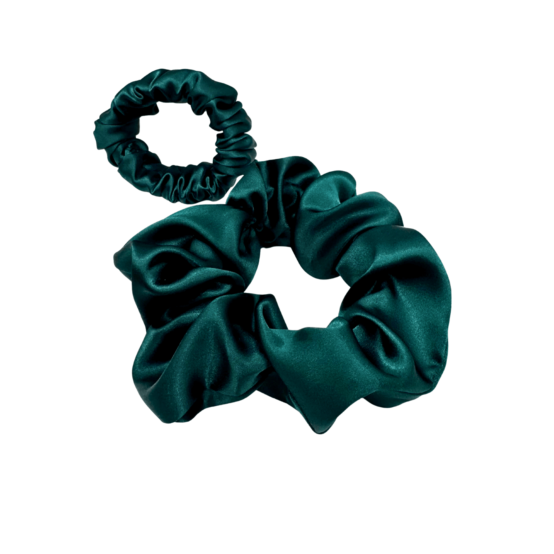 Emerald green satin scrunchie with a soft, luminous sheen and gently gathered folds. Handmade in Canada for elegant, damage-free styling and a secure, gentle hold.